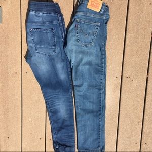 Two pairs of boys jeans.